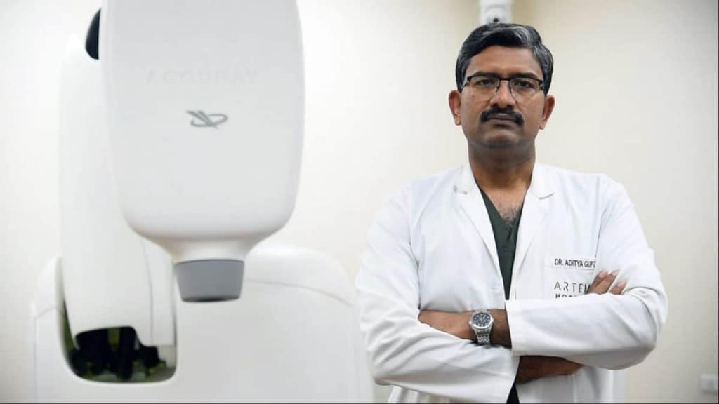 Dr Aditya Gupta Director Neurosurgery Agrim institute of Neurosciences at Artemis Hospital with M6 Cyberknife – The News Mill