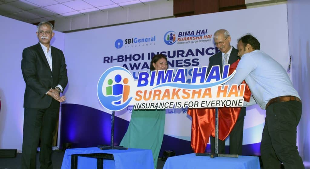 Sujay Banerjee IRDAI Member Distribution unveils the year long insurance awareness drive by SBI General Insurance as Pushan Mahapatra MD CEO SBI General Insurancelooks on in Nongpoh – The News Mill