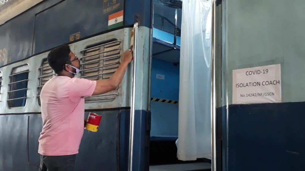 Indian railway employees work to convert a train coach into an isolation ward for fight against novel Coronavirus in Guwahati on March 29 – The News Mill