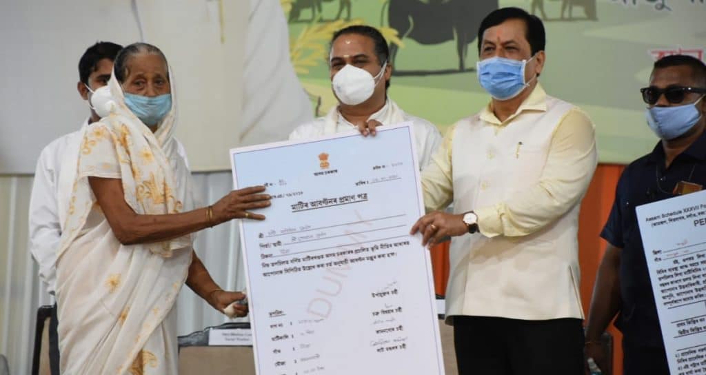 Chief Minister Sarbananda Sonowal is presenting land pattas and allotment certificates to the landless indigenous families at a programme held at Majuli on October 5 2020 – The News Mill