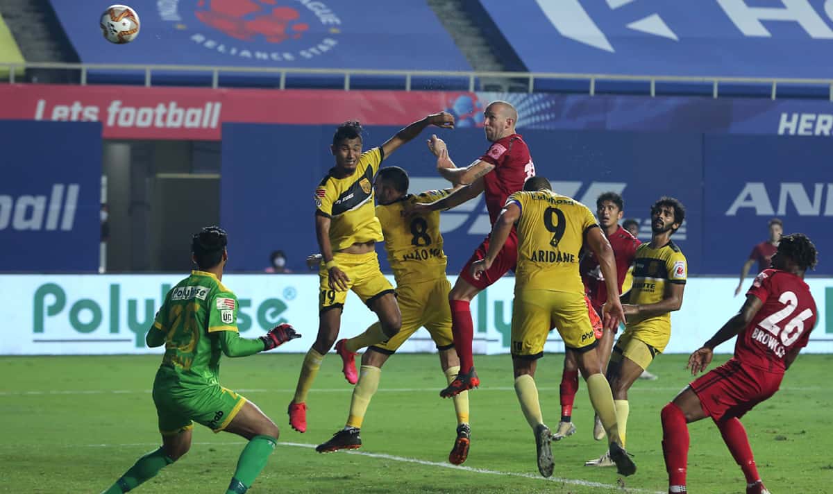 NEUFC's Benjamin Lambot go up for header during match 86 of the 7th season of Indian Super League | Photo: ISL