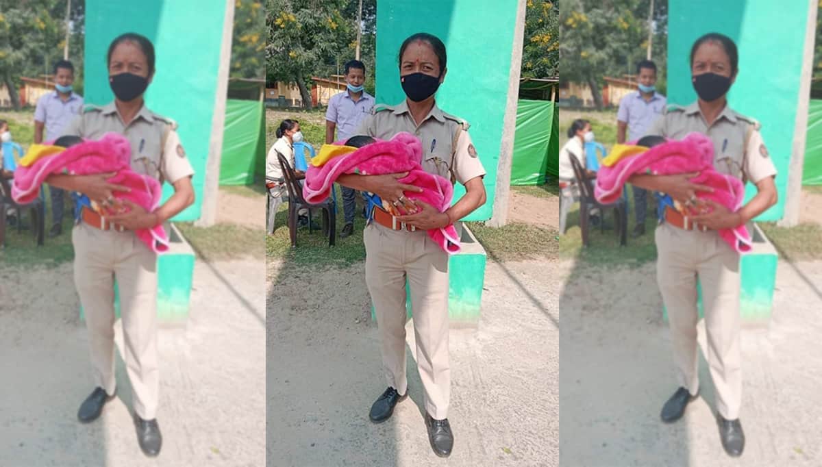 Assam cop wins hearts for taking care of baby while mother writes TET exam