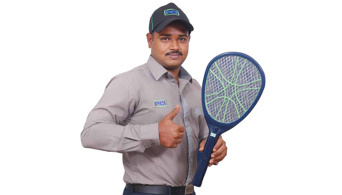 Technician with anti-mosquito Racquet