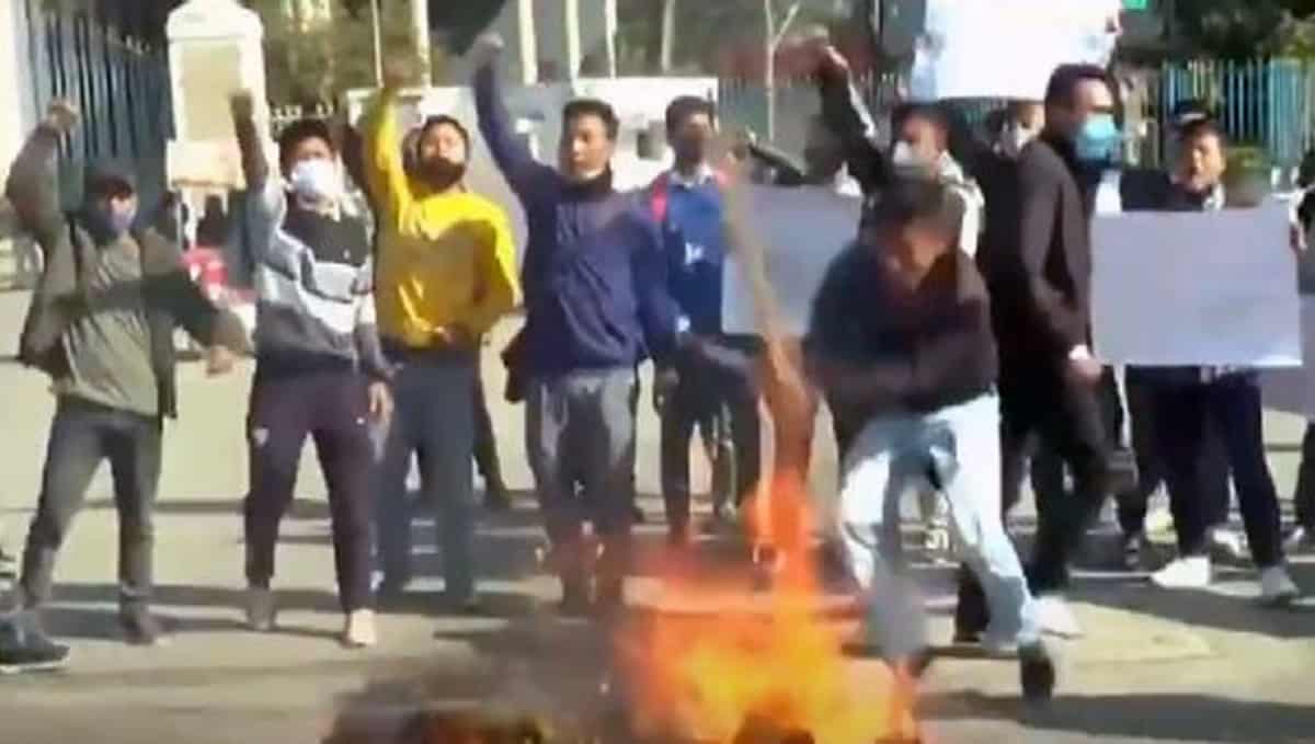 Members of students' wing of JCILPS burning effigies of leaders of Amra Bengali in Imphal Manipur on Friday 1