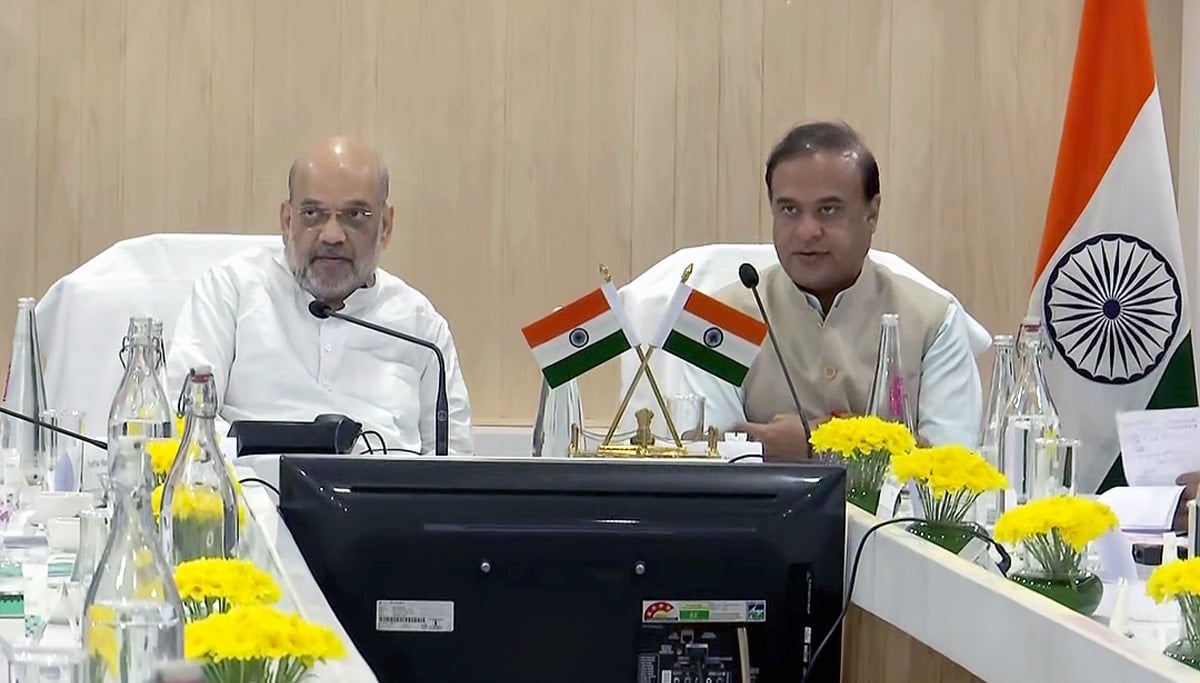 Union home minister Amit Shah along with Assam CM Himanta Biswa Sarma take part in a meeting over Assam floods, in Guwahati on October 7 | ANI Photo