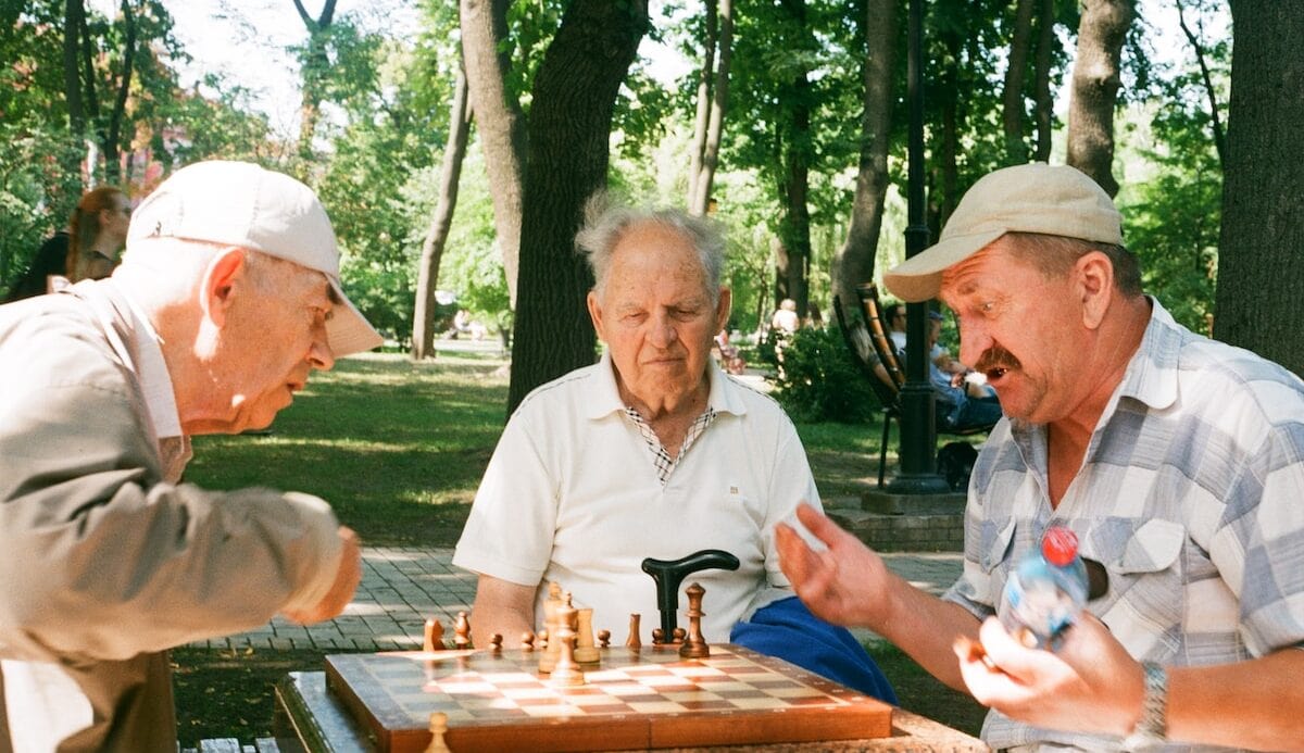 men playing chess senior citizen creativity