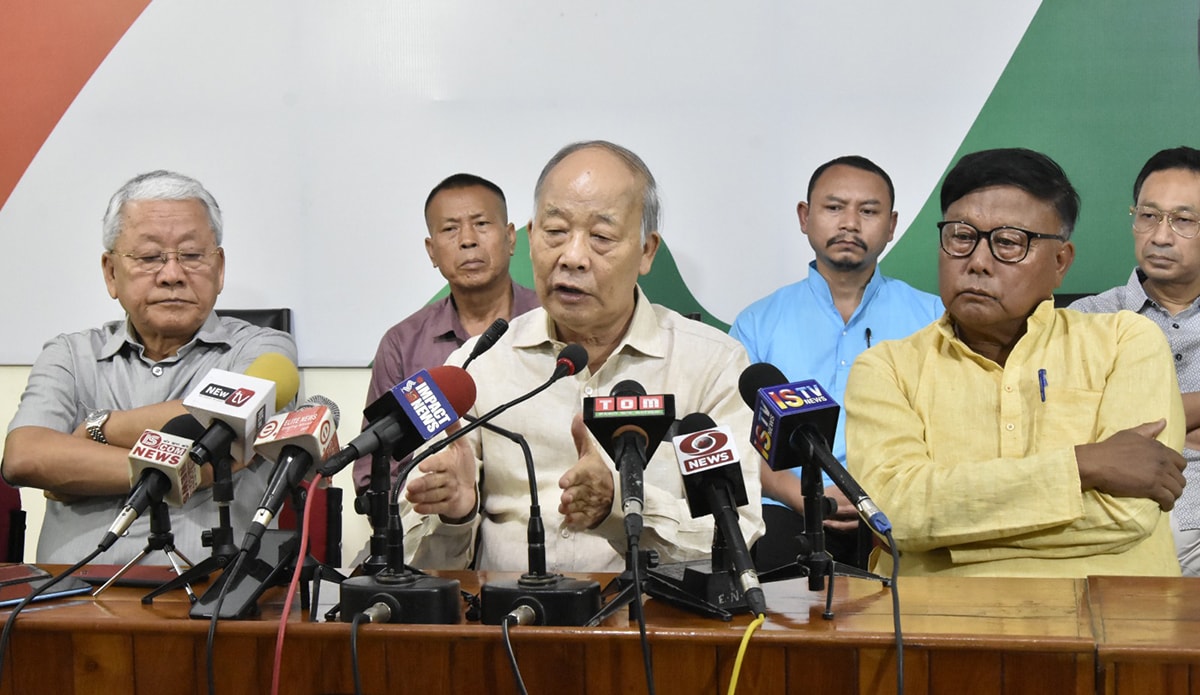 Former Manipur CM O Ibobi Singh along with leaders of nine other opposition political parties addressing media in Imphal on Monday
