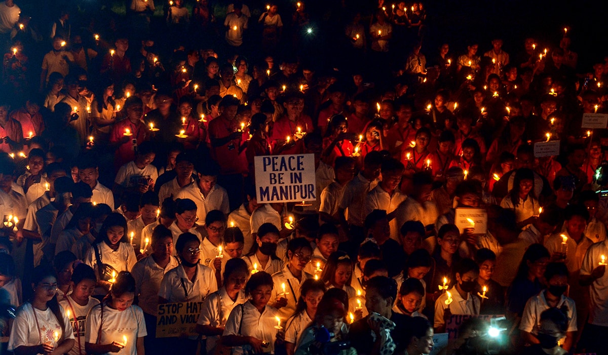 People take out a candlelight march demanding peace in violence-hit Manipur | File photo